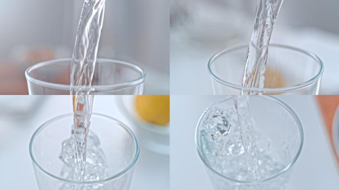 一股水流入玻璃杯水涟漪浇注