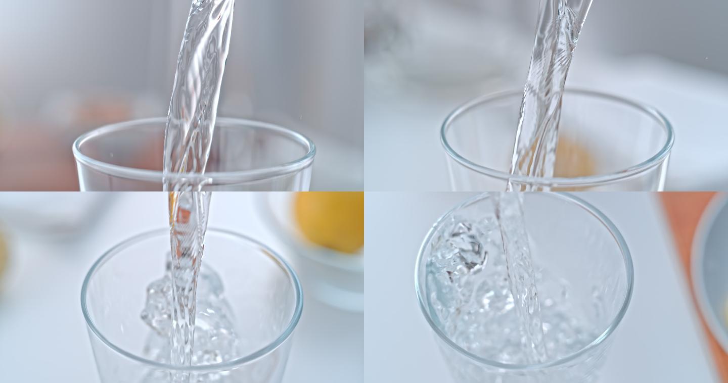 一股水流入玻璃杯水涟漪浇注
