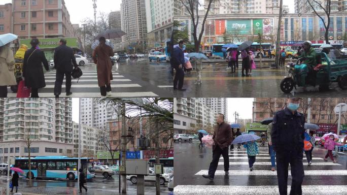 雨中城市行人车流下雨天气雨天车流街道