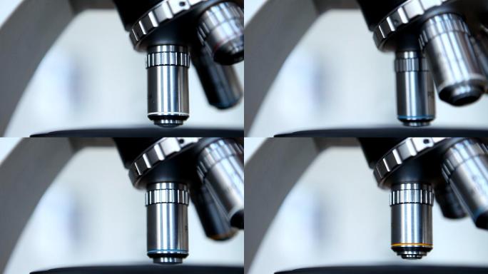显微镜正在转动医学透镜光学仪器