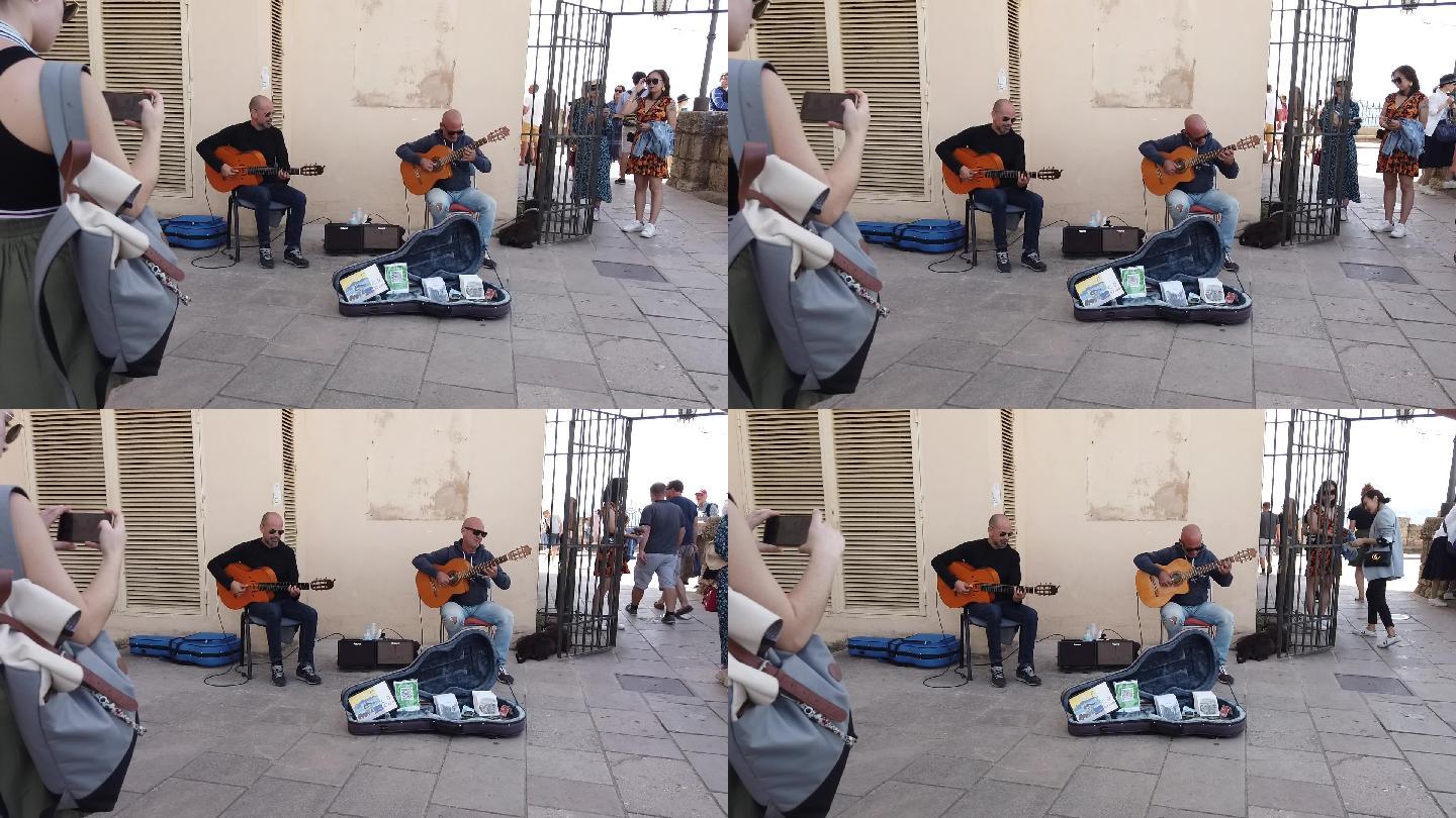 国外街边卖唱歌手户外吉他歌手国外街头