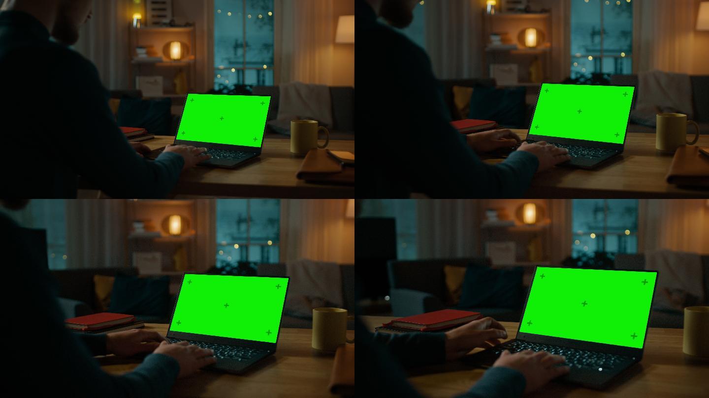 男人用笔记本电脑。