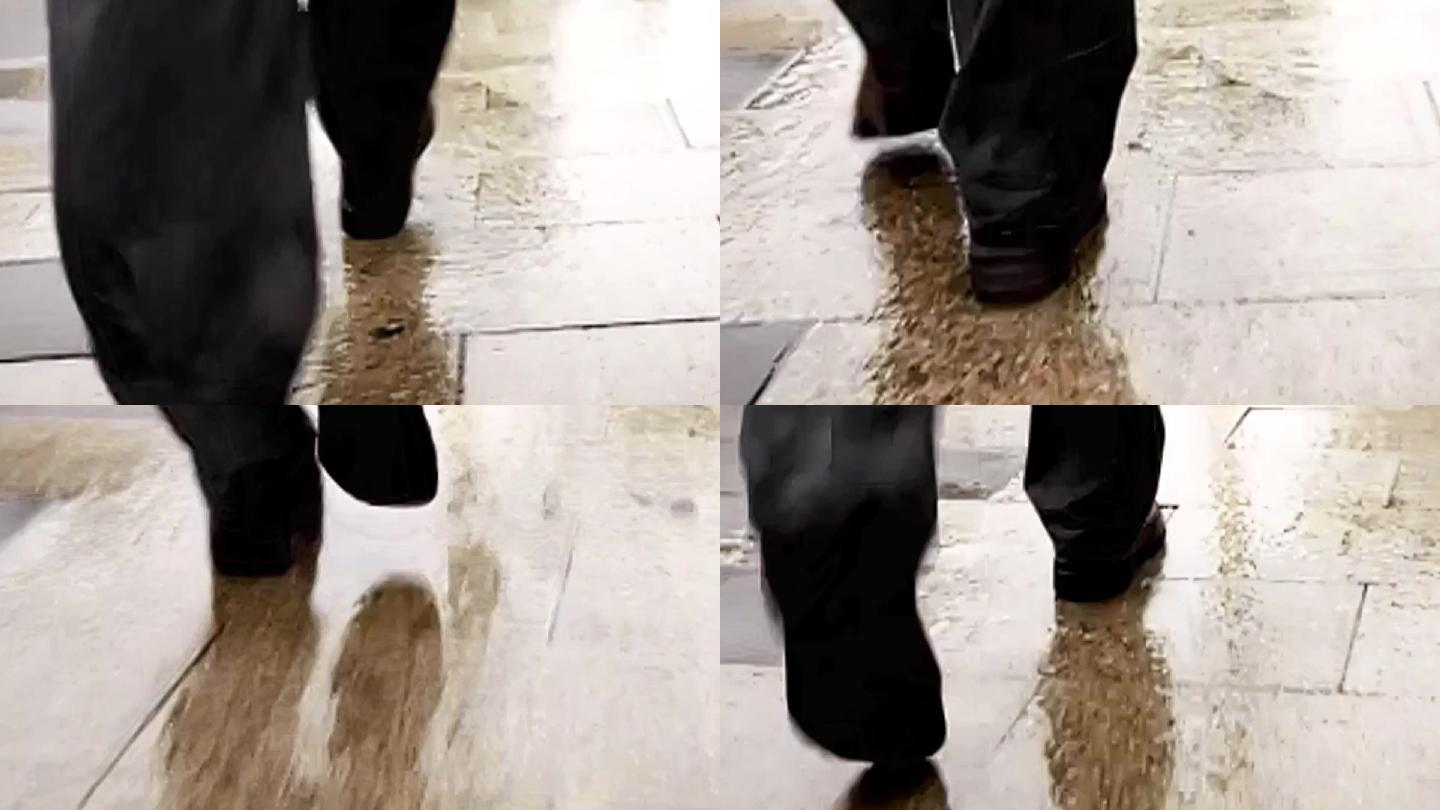 男人脚步雨后行走视频素材