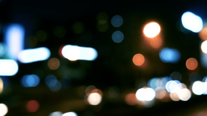 夜间交通散焦视图虚焦街头灯光
