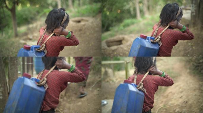 尼泊尔小姑娘背着一大壶水