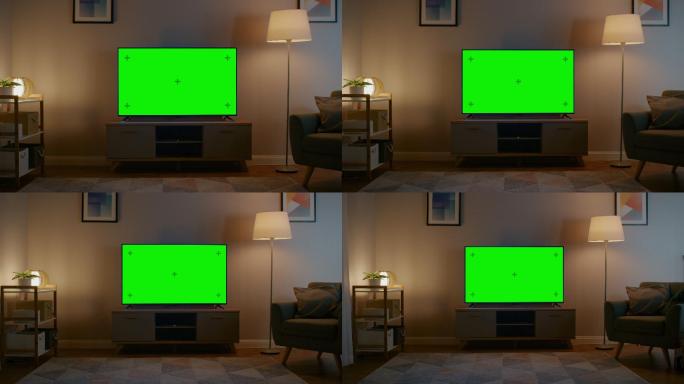 在客厅里，有一台绿色屏幕的电视机