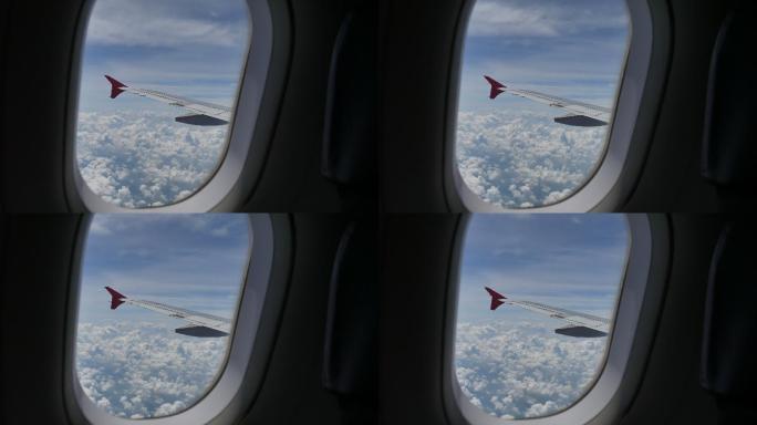 从飞机窗口看风景飞机舷窗飞行旅途出差出国