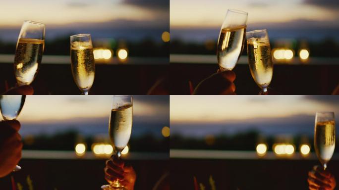 日落与香槟庆祝碰杯酒