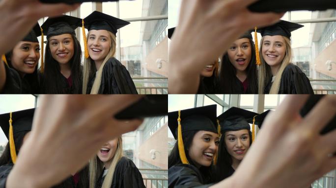 高中或大学女生朋友在毕业典礼后自拍。