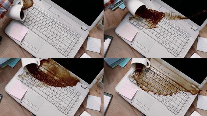 洒在笔记本电脑上的咖啡