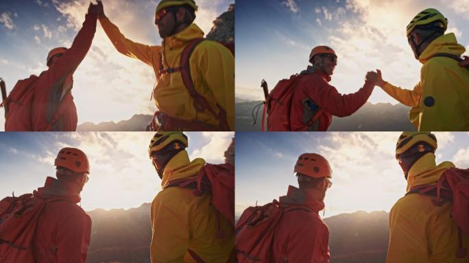 日落时分，两位登山者在山顶握手