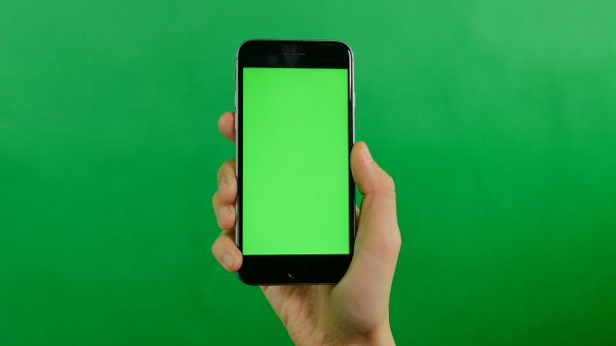 绿色背景上一个空白的手机