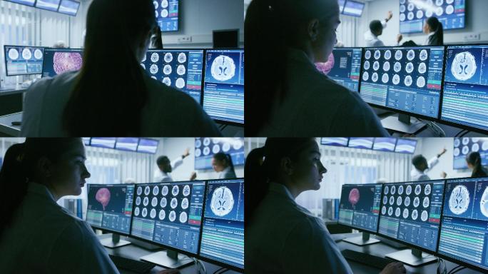 女科学家在电脑上处理脑部CT扫描图像
