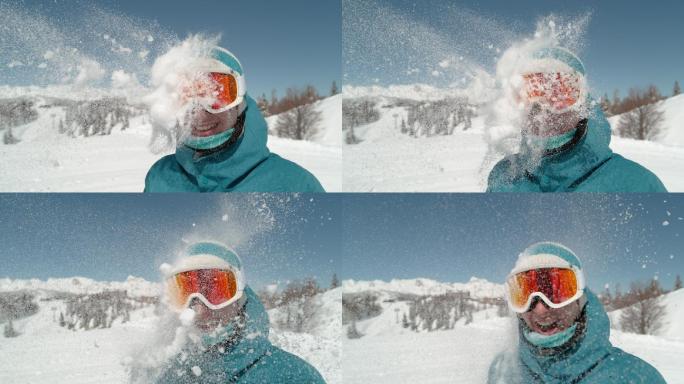 戴着滑雪镜的男孩被雪球击中头部。