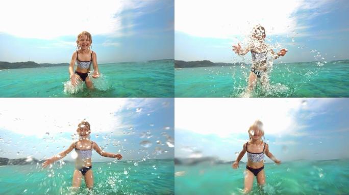 高清超慢镜头：小女孩对着镜头泼水