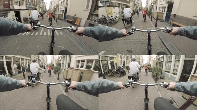在荷兰阿姆斯特丹的街道上骑自行车