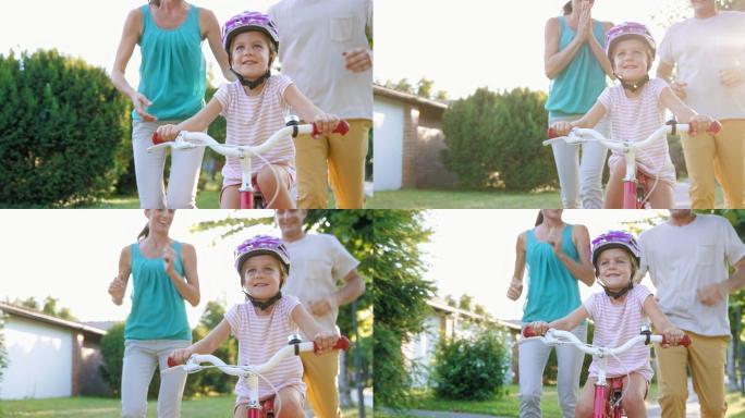第一次骑自行车的孩子家长们都在鼓掌