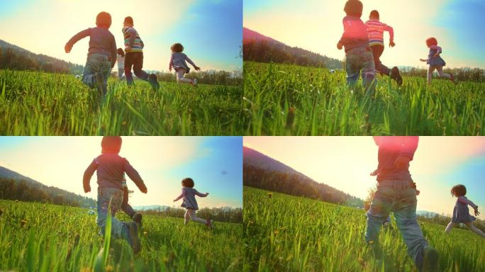 在阳光明媚的草地上，孩子们在追球