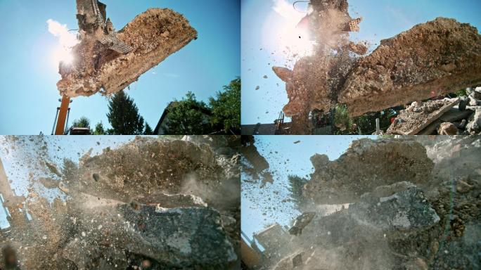 一个建筑工地上挖掘机释放碎片的慢镜头