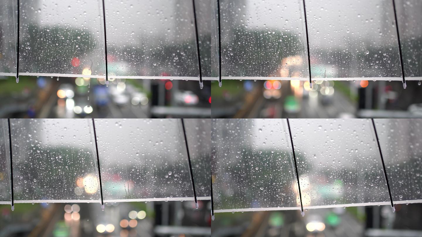 雨天的城市路口，透明伞雨滴