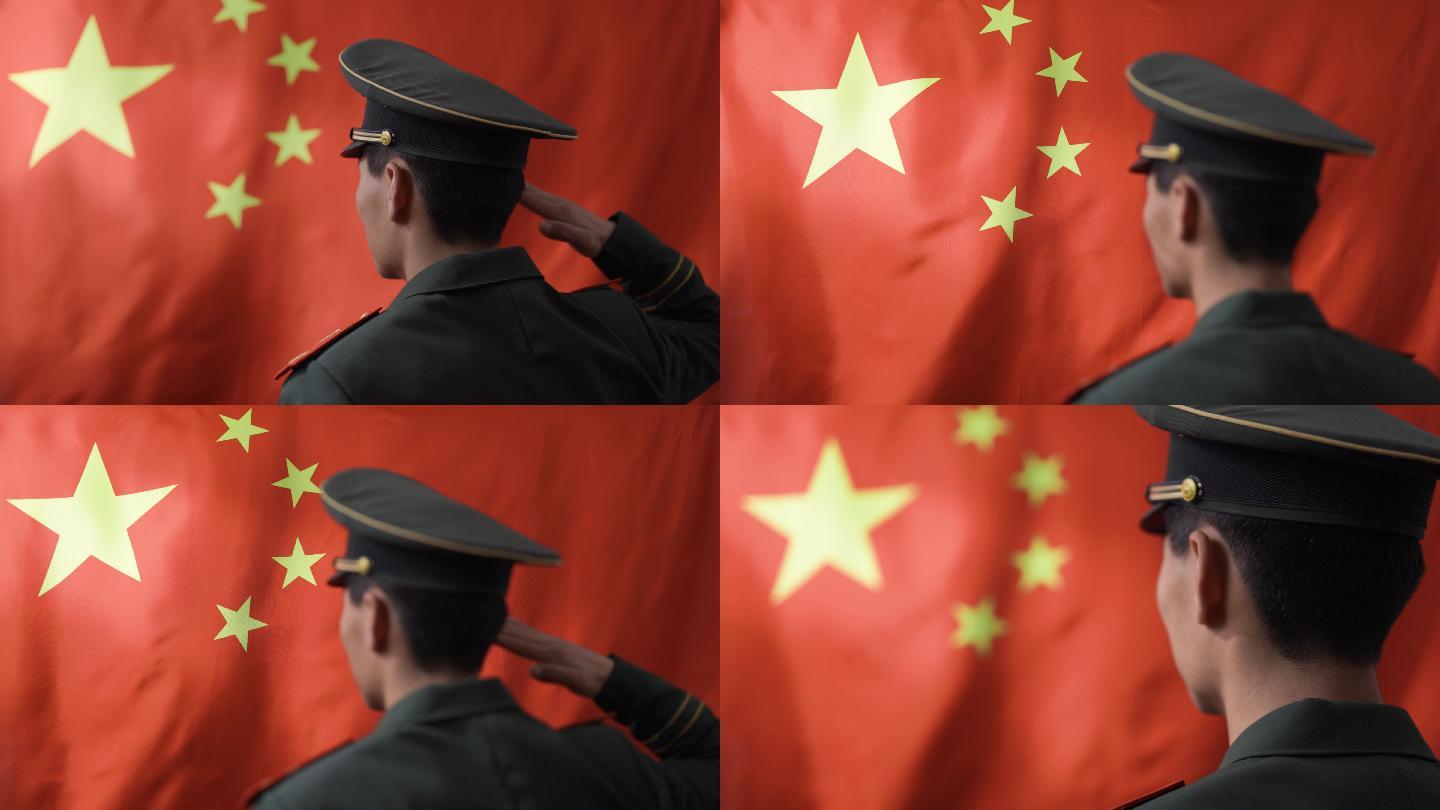 4K军人穿军装向飘扬的红旗敬礼视频素材