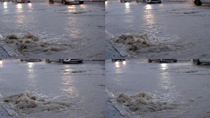 雨后的洪水顺着道路上的排水沟流下