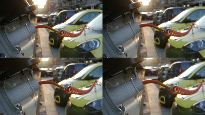 黄色电动汽车充电端口的特写镜头