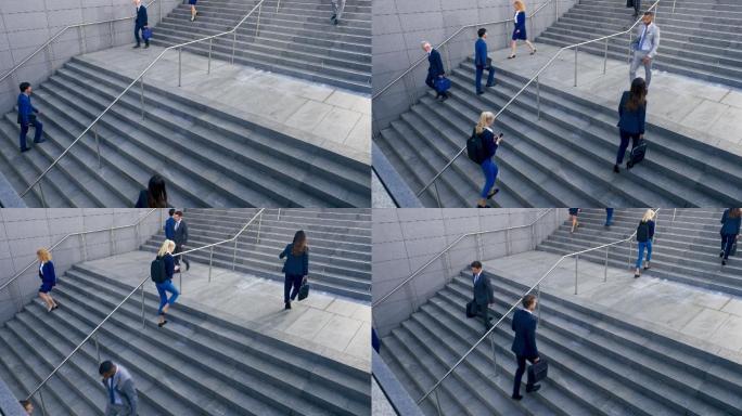 穿着西装的人在商业大楼外的楼梯上走来走去