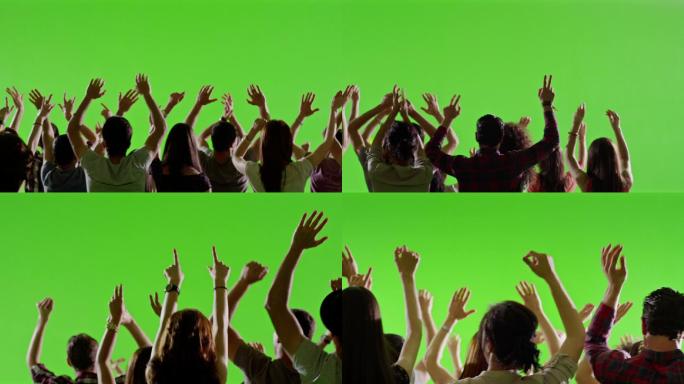 一群人在绿色屏幕前跳舞
