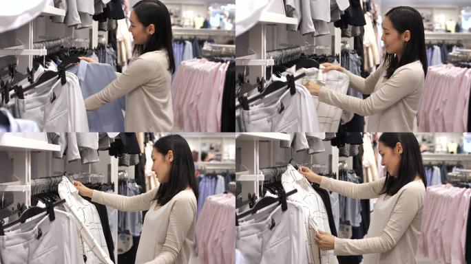 在商店看衣服的女人