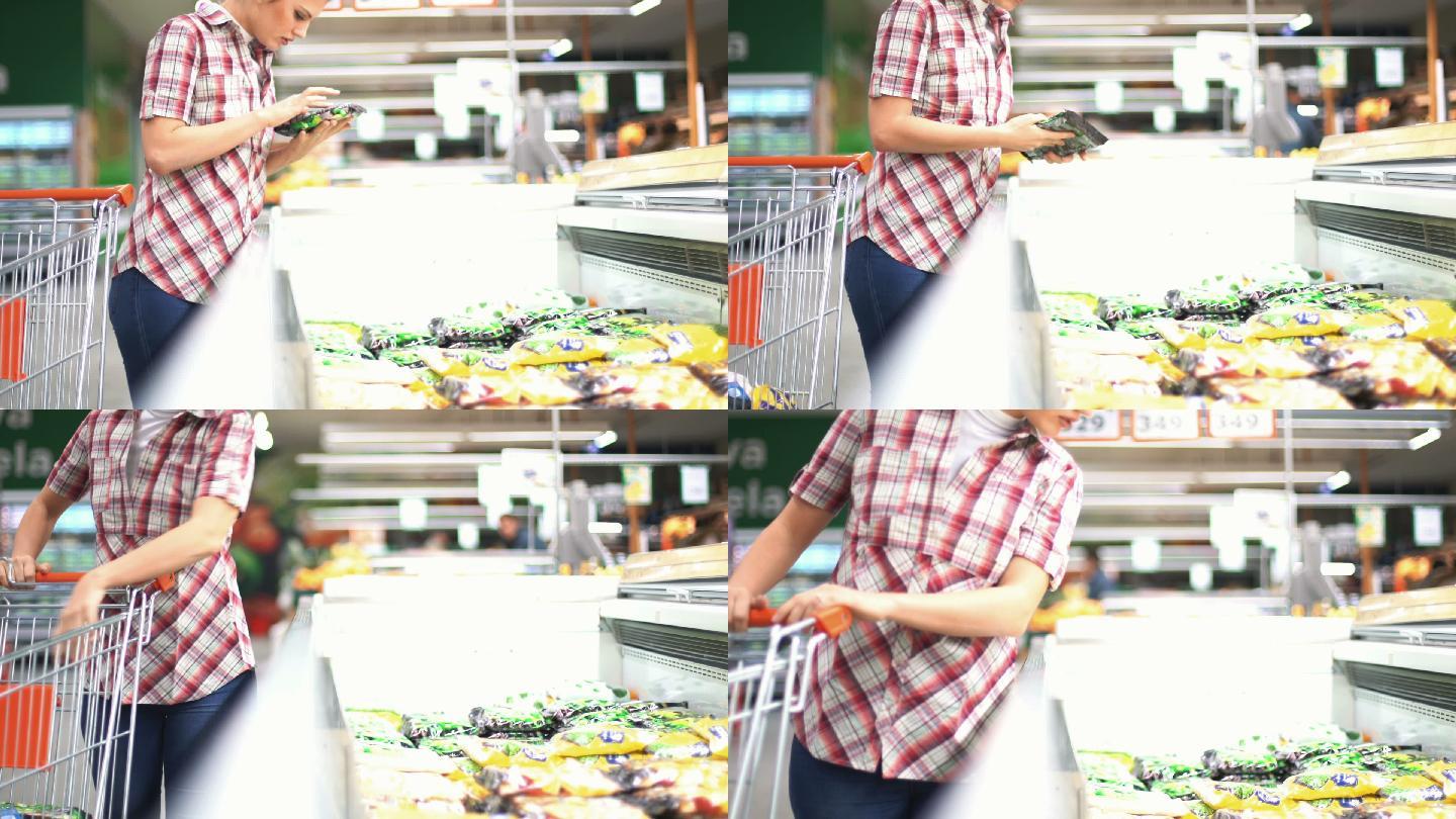 在超市挑选食物的女人