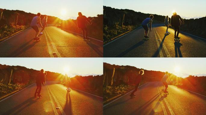 朋友们在日落时玩滑板