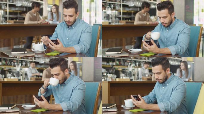 男子在咖啡店玩手机