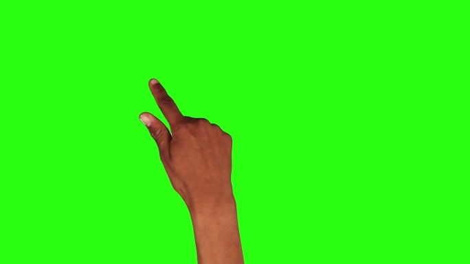 一只手在绿色屏幕上滑动。