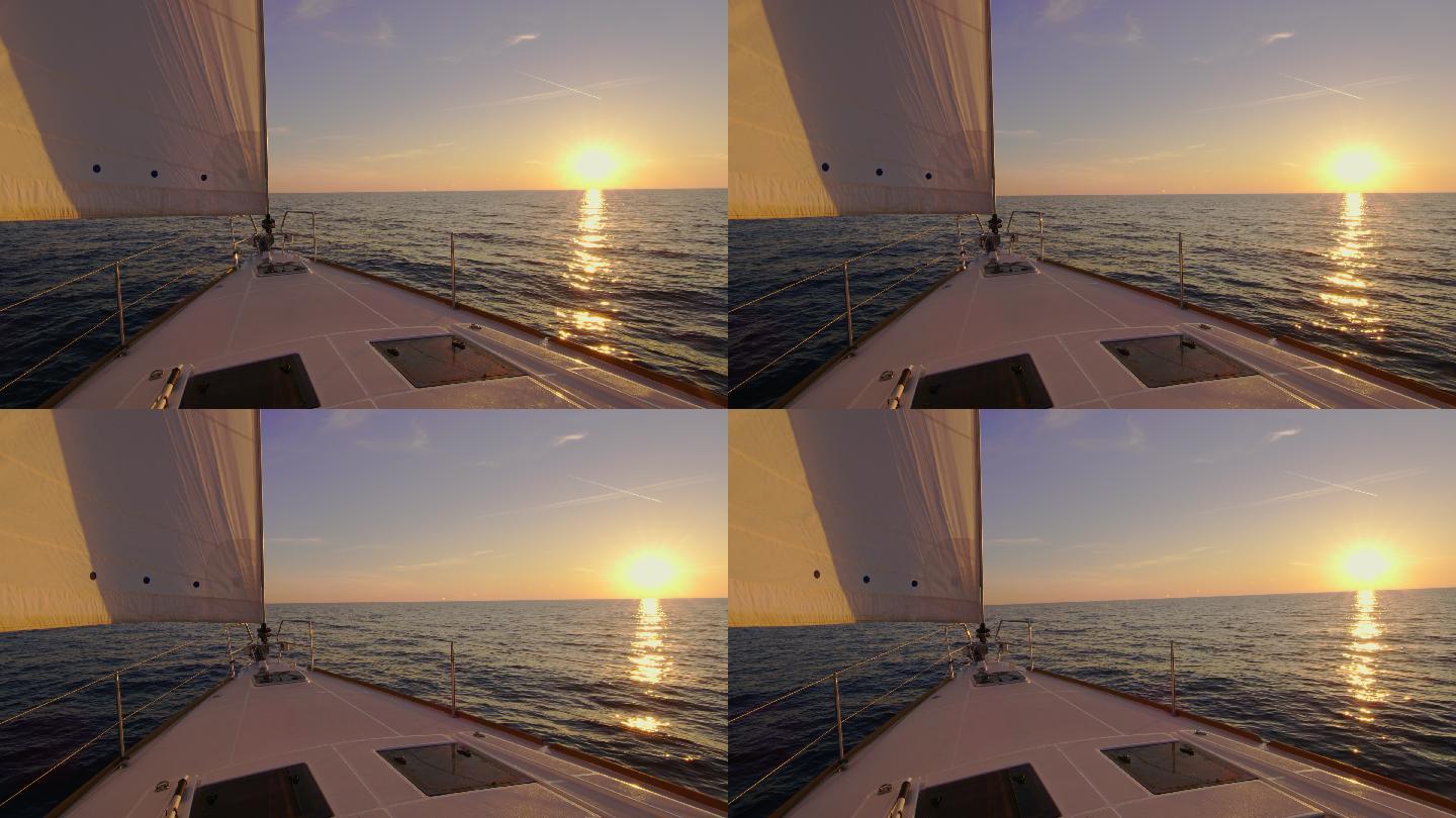 夕阳下的帆船轮船帆船邮轮出海夏天海南大海
