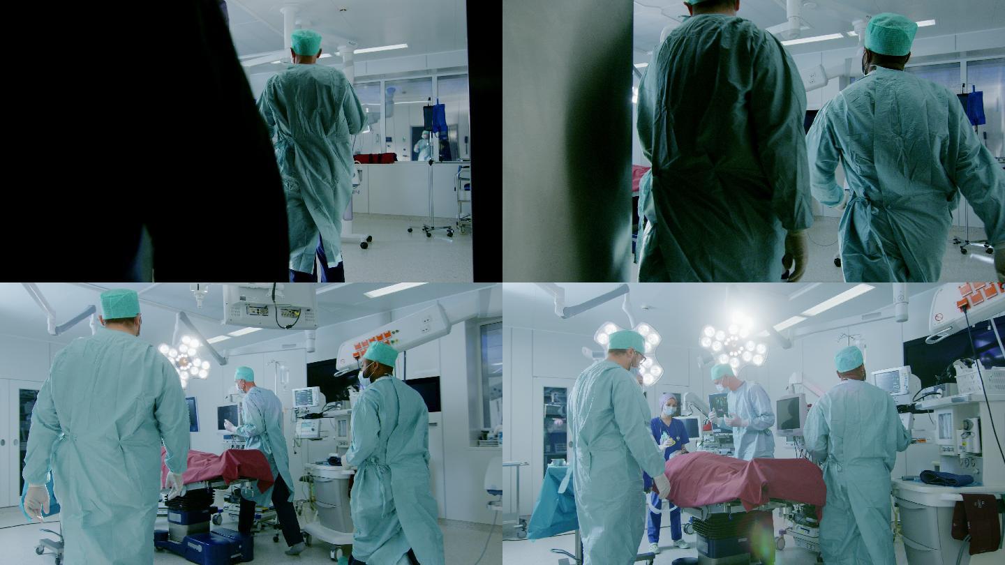 外科医生和助手走进手术室准备给病人做手术
