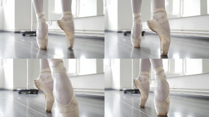 穿芭蕾舞鞋的舞者排练舞者室内