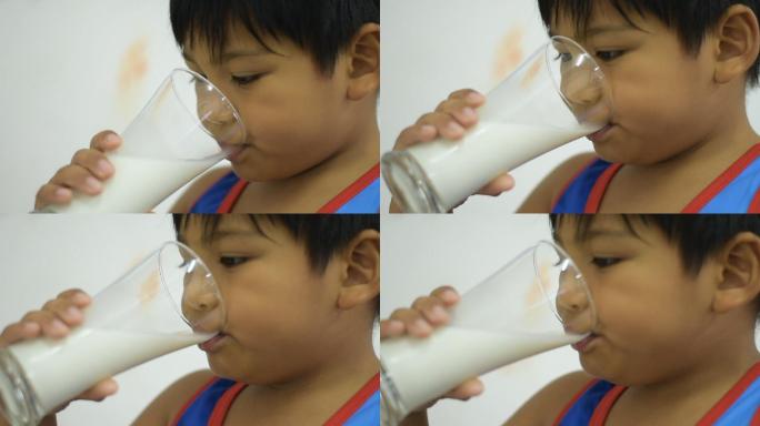 孩子喝牛奶滴牛奶下落奶滴皇冠浓郁升格液体