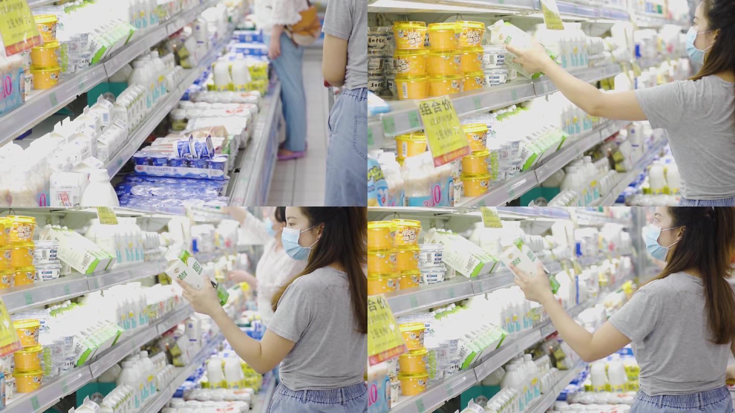 女生逛超市选购商品牛奶货架