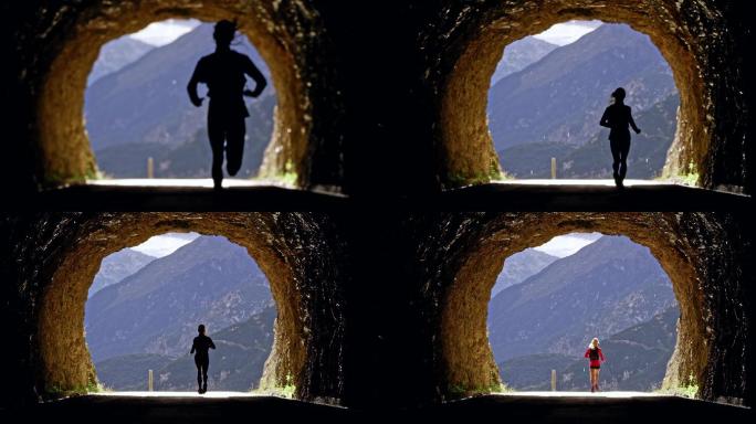女运动员在阳光下冲出高山隧道