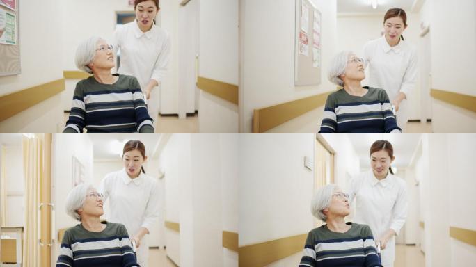 护士推着轮椅上的病人