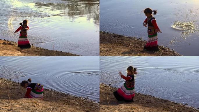 童年--河边玩石头的小女孩