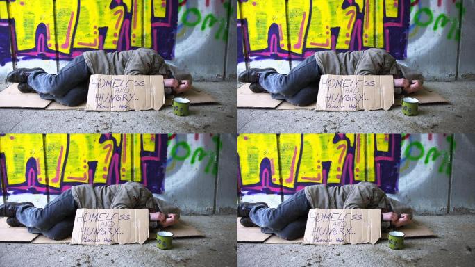 无家可归的人睡在地下通道