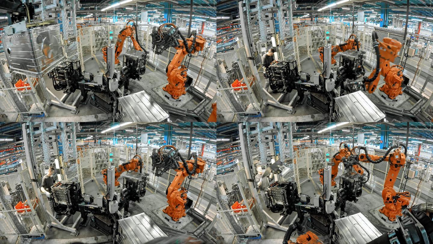 工业机器人在工厂里搬运金属制品