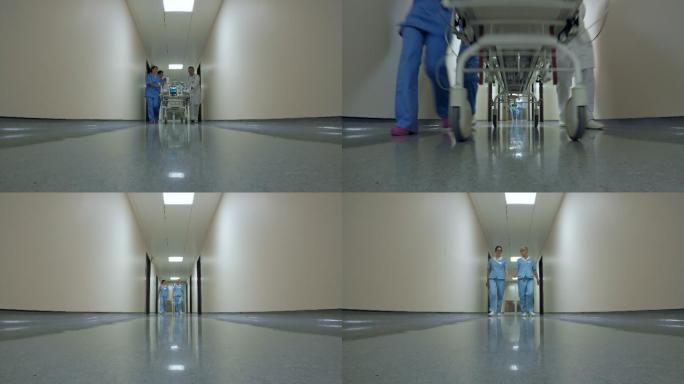 医疗队推着担架走过医院走廊