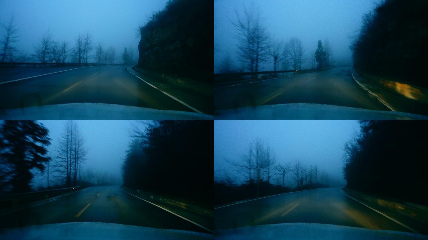 晚上在雾山上开车的汽车