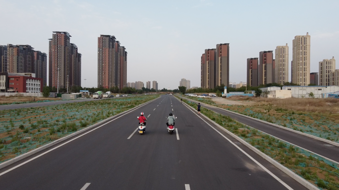 航拍建筑公路摩托车