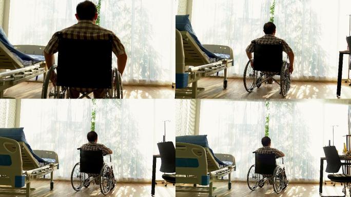 坐在轮椅上看窗外残疾人渴望
