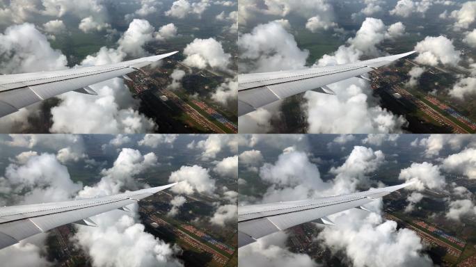 从飞机窗口观看鸟瞰大气层云彩云层