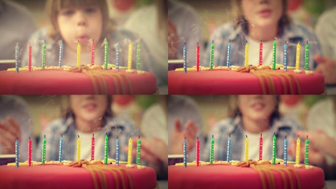 生日蛋糕上的蜡烛被吹灭了